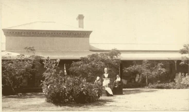 Nurses in the garden outside Kimberley Hospital circa 1900