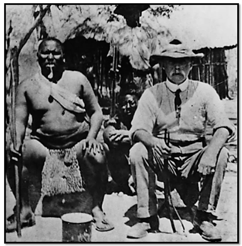Historic black-and-white photograph of King Lobengula of the amaNdebele seated beside the explorer Frank 
